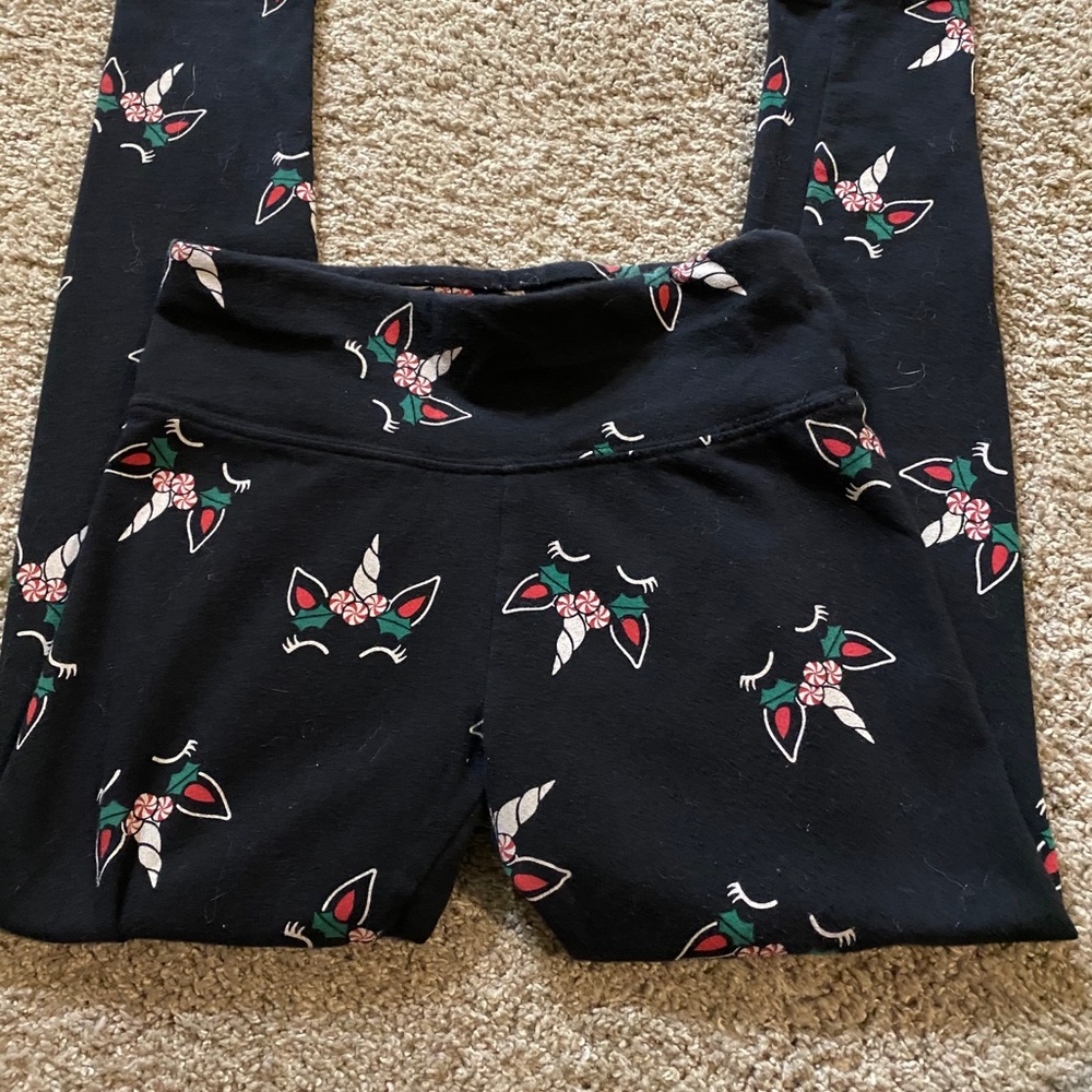 Justice size 8, girls Christmas unicorn leggings.